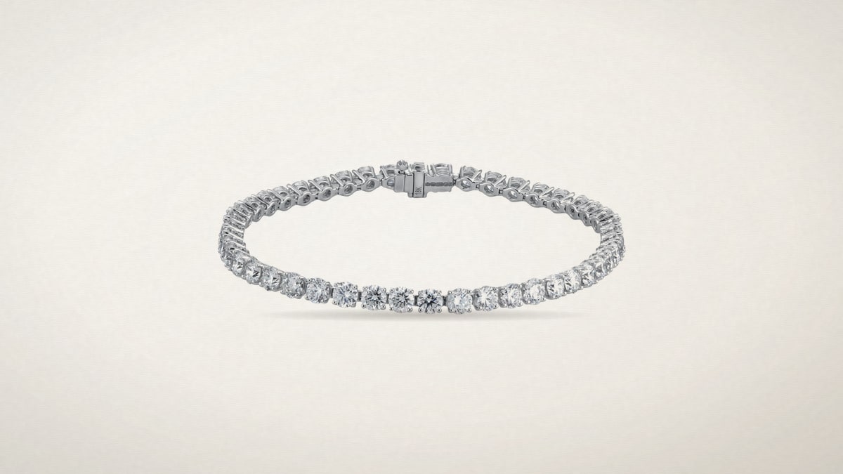 Goldsmiths 18ct White Gold 10.00cttw Brilliant Cut Diamond Line Bracelet, Gucci 18ct Yellow Gold Lion Head Diamond & Tourmaline Necklace, Mappin & Webb Ena Harkness Three Stone Engagement Ring 1.20 Carat Total Weight